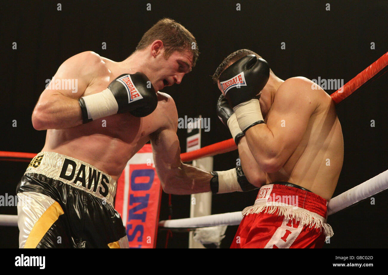Lenny Daws (left) on his way to beating Sergejs Savrinovics on the undercard of the during the British Lightweight Title fight at the Robin Park Centre, Wigan. Stock Photo