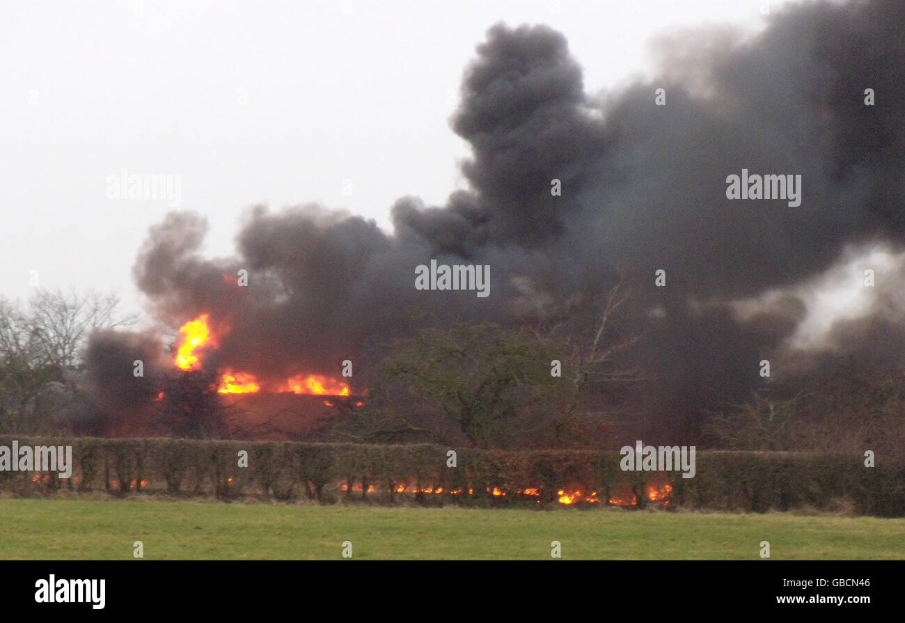 The scene of an intensive blaze after a freight train carrying fuel derailed and caught fire near Stewarton in Ayrshire. Stock Photo