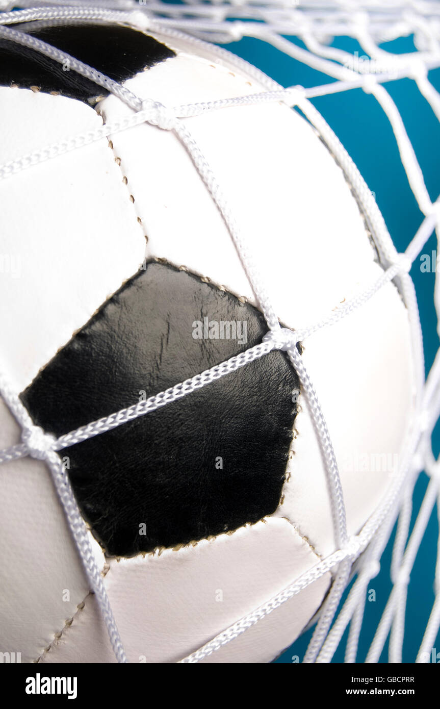 A Soccer Ball Into The Net Goal Concept Stock Photo Alamy