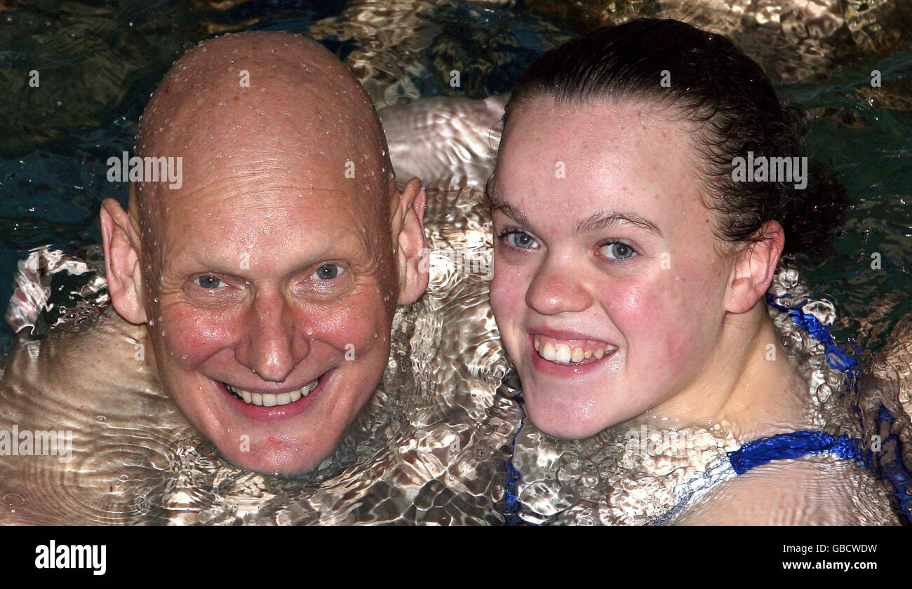 Olympic gold medallist Duncan Goodhew MBE and Paralympic double gold medallist Eleanor Simmonds swim with the Aquabatix synchronised swimming team to launch the nationwide Swimathon charity event at Clissold Leisure Centre in London. Stock Photo