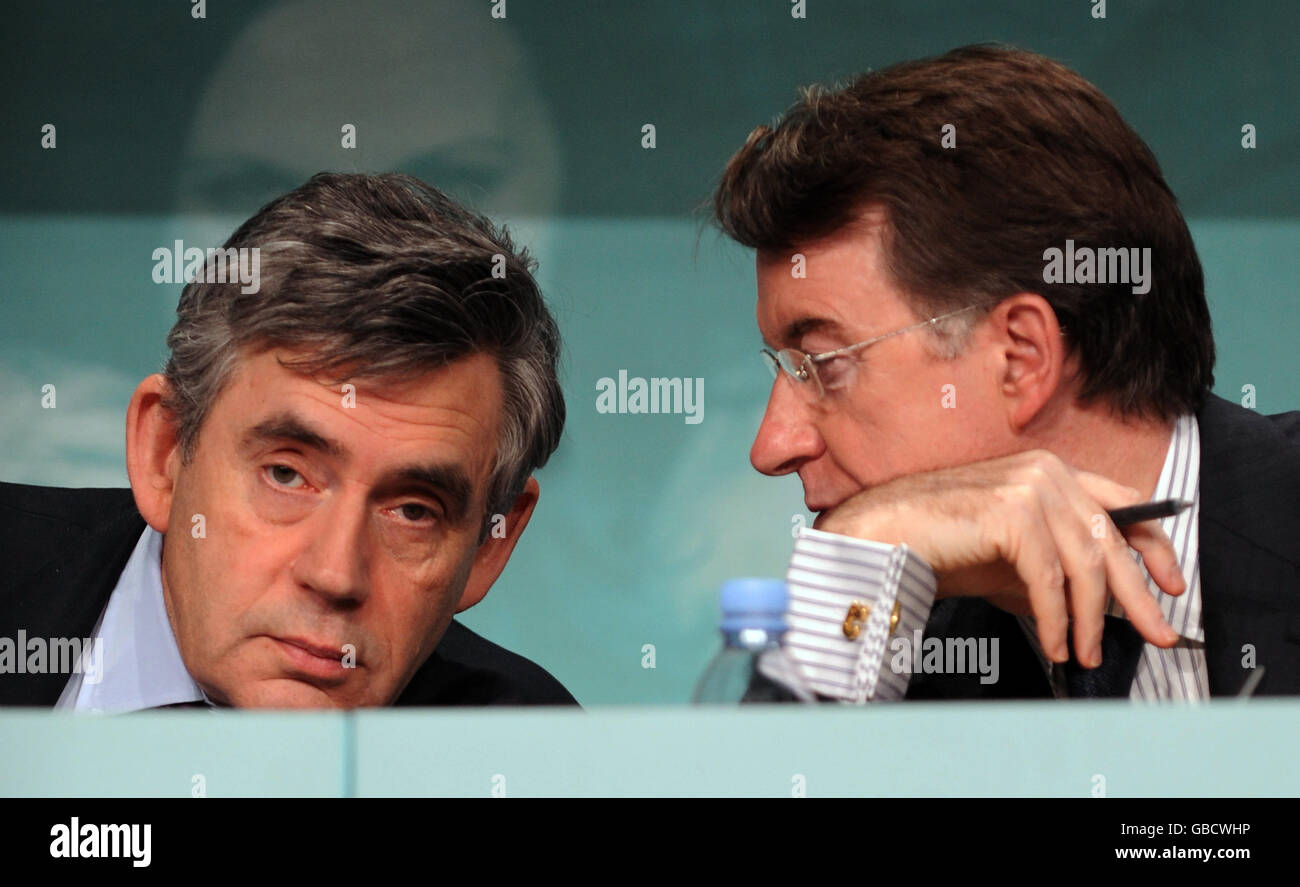 Prime Minister Gordon Brown and Business Secretary Peter Mandelson listen to questions at an Employment Summit in central London. Stock Photo