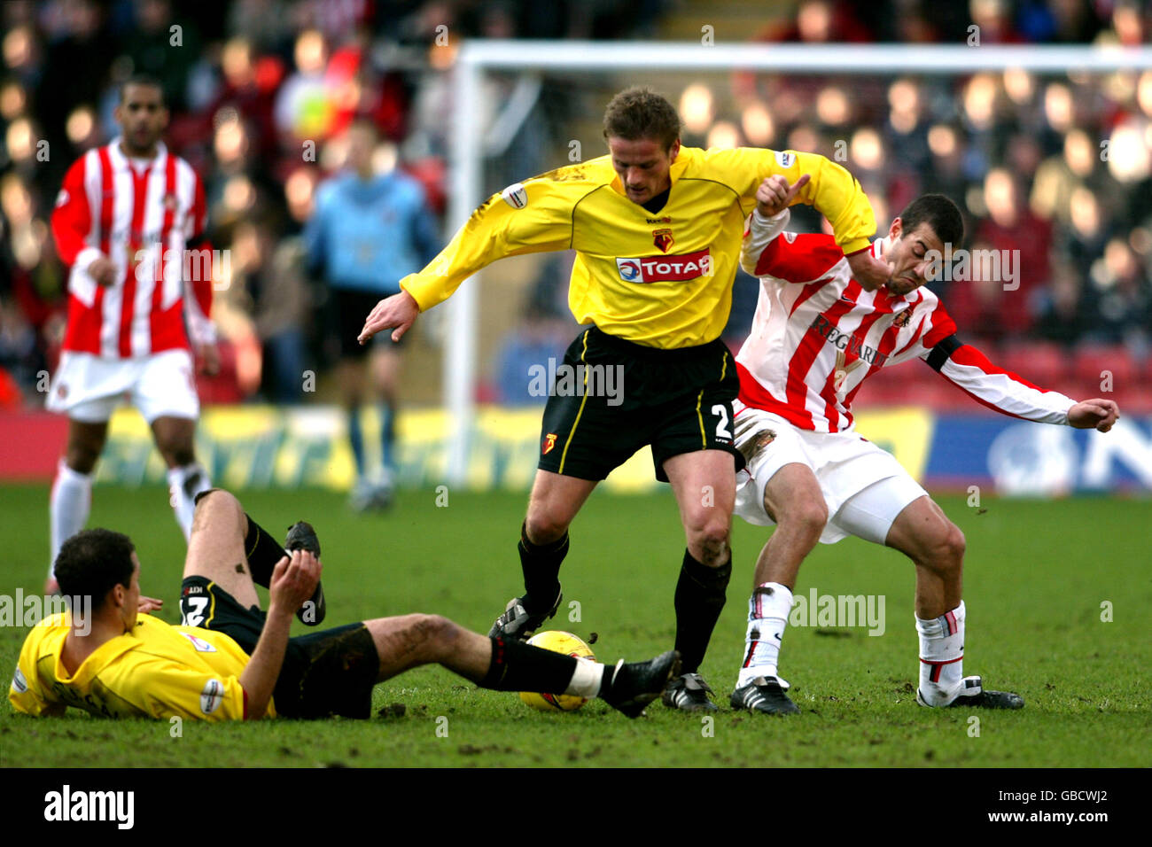 l-r Watford's Scott Fitzgerald, Neal Ardley and Sunderland's Julio Arca battle for the ball Stock Photo