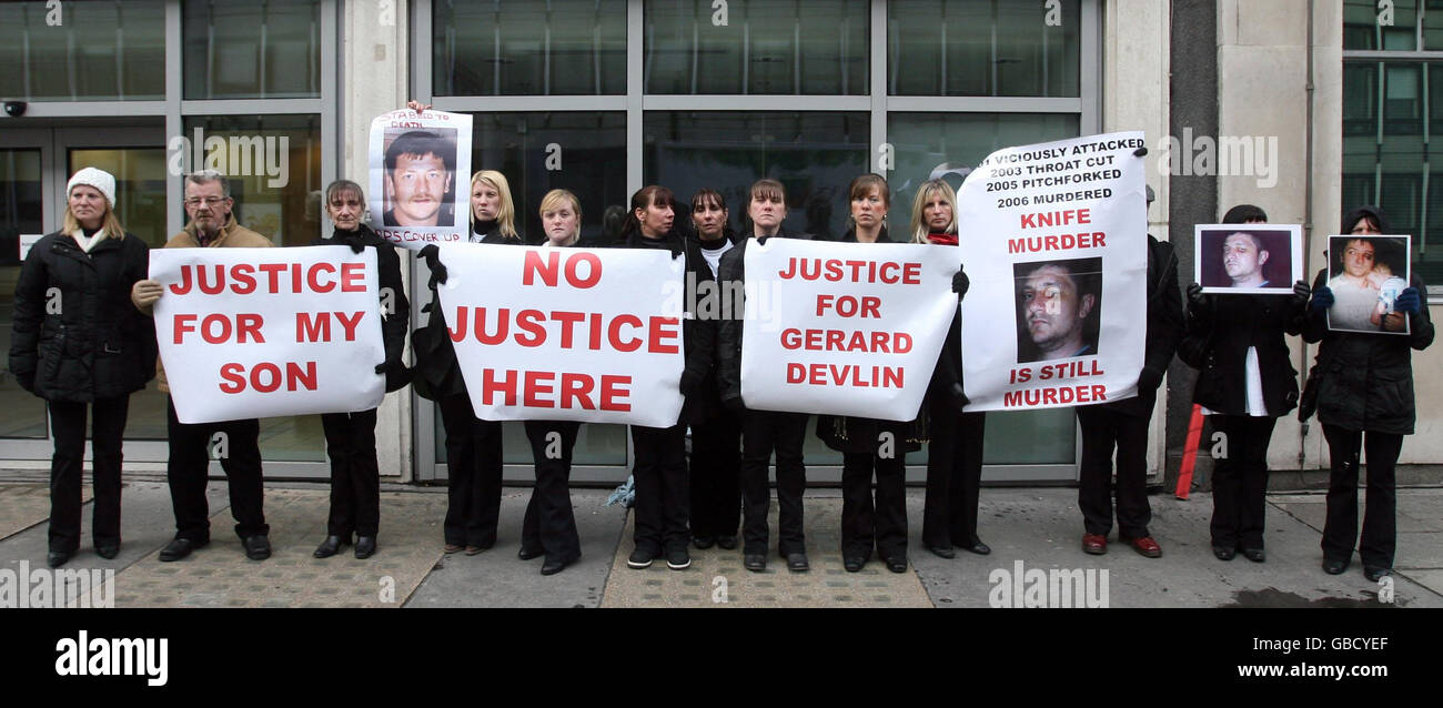 Friends and family of Gerard Devlin protest outside the Attourney General's Office on Victoria Street in London. Stock Photo