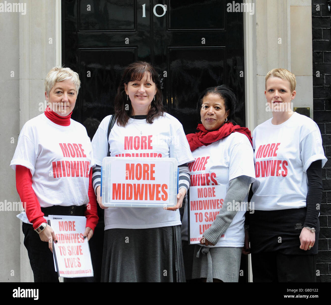 (left to right) Midwives Catherine Parker-Littler, Dr Mary Steen, Diane Jones and mother Laura Miller deliver a petition, which is signed by 30,000 midwives, health professionals and parents, to Downing Street. The petition calls for an additional 10,000 midwives to be trained. It also wants every mother to have access to a qualified midwife throughout labour and a named midwife during pregnancy, birth and the postnatal period. Stock Photo