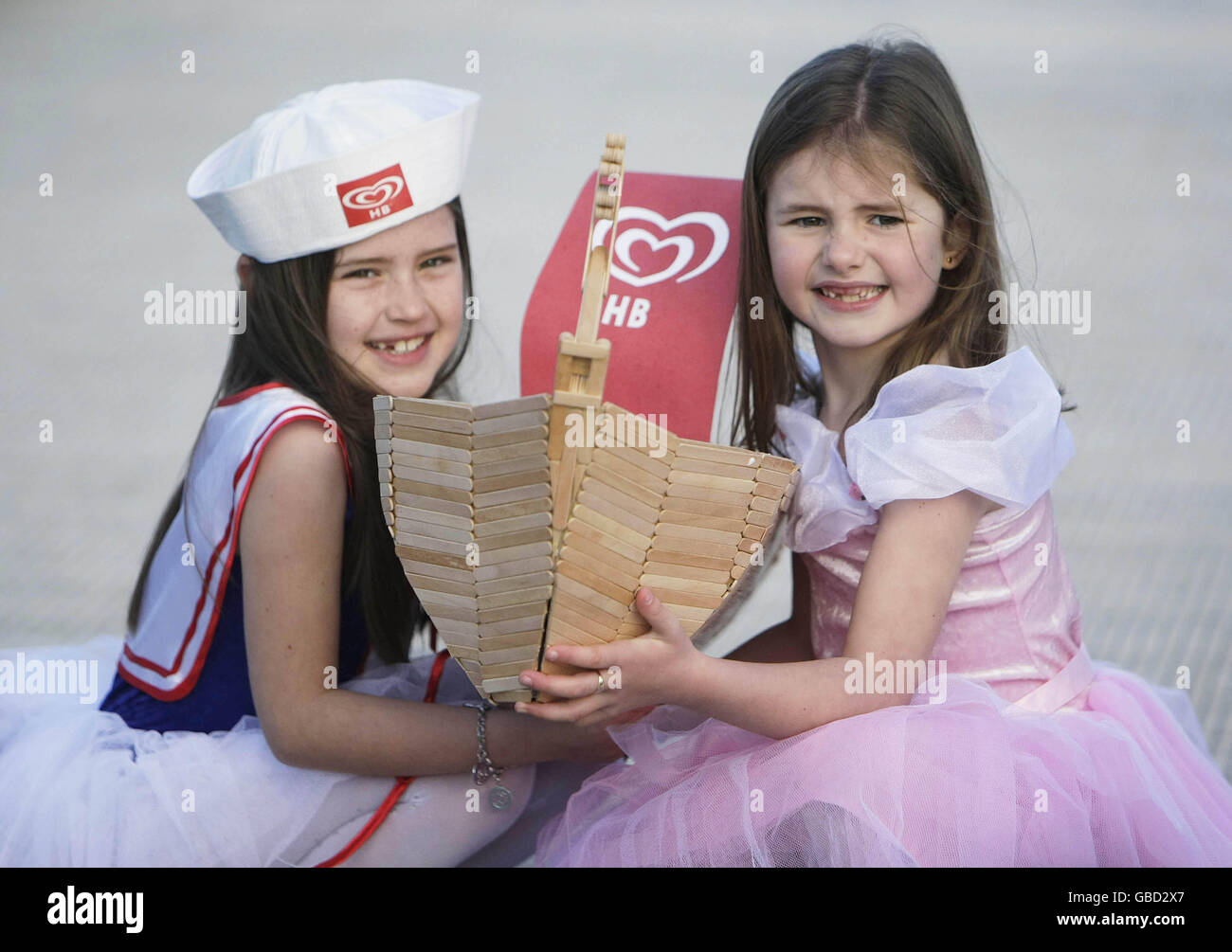 (left to right) Kaitlin Dunne, 8, and Leah Cleer, 7, help launch the HB Let's Sail Competition, as part of the Volvo Ocean Race Galway stopover 2009. Stock Photo