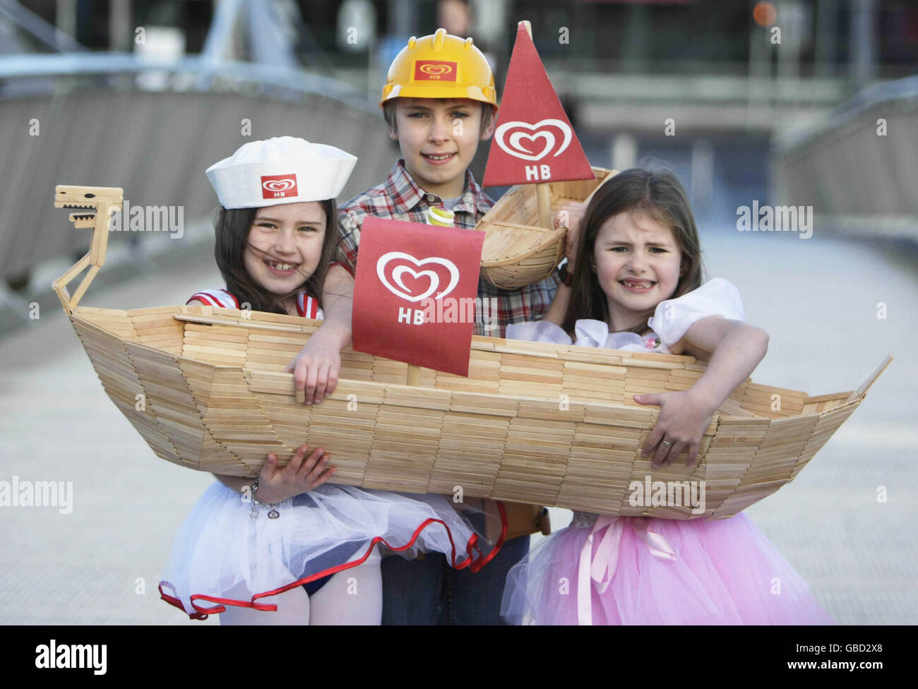(left to right) Kaitlin Dunne, 8, James Hegart, 9, and Leah Cleer, 7, help launch the HB Let's Sail Competition, as part of the Volvo Ocean Race Galway stopover 2009. Stock Photo