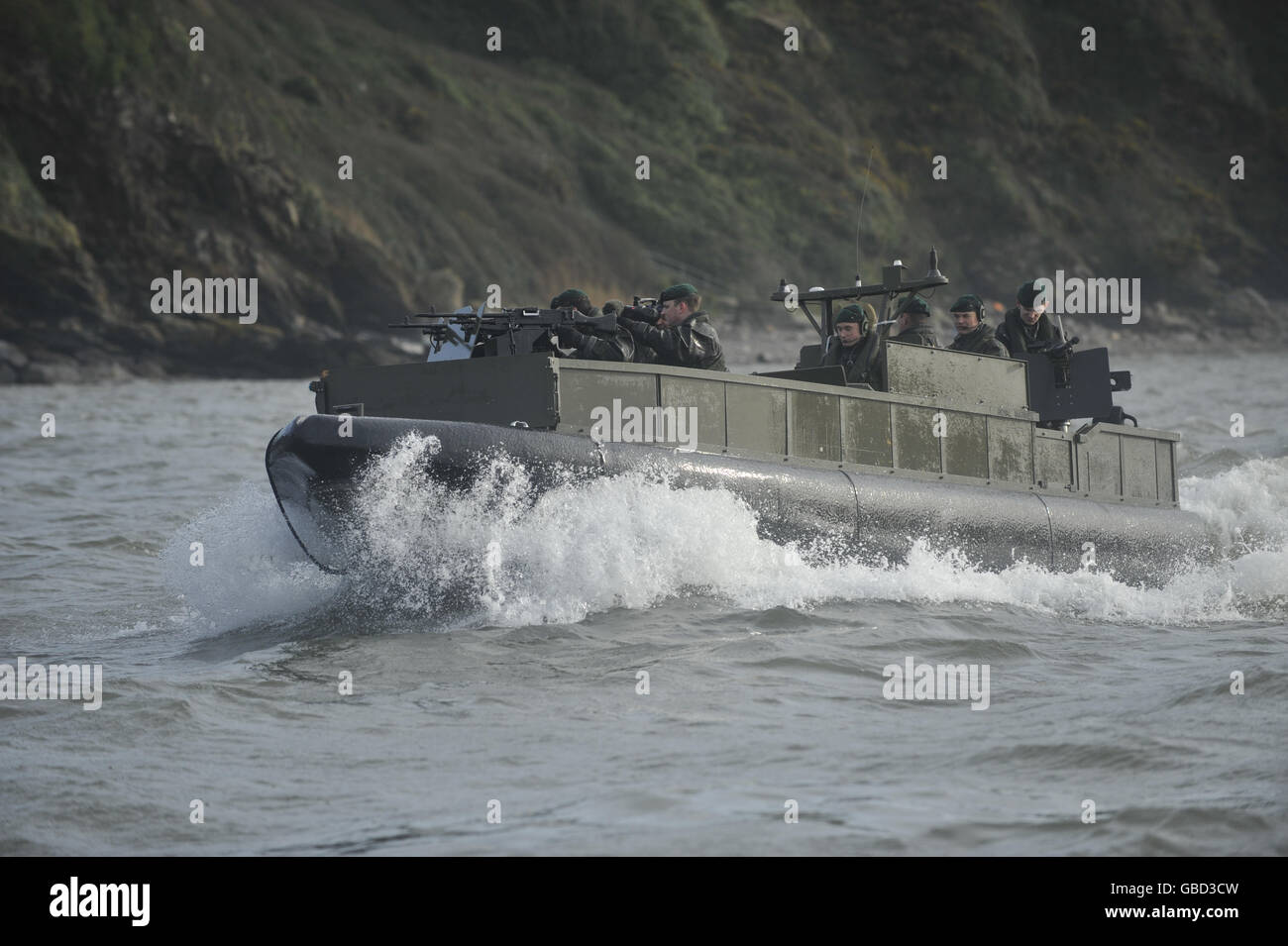 The latest variant of the Royal Marines Offshore Raiding Craft (ORC) with beefed up armour plating and central consol position (Mid-Consol Variant MCV) in the waters just offshore in Plymouth. Stock Photo