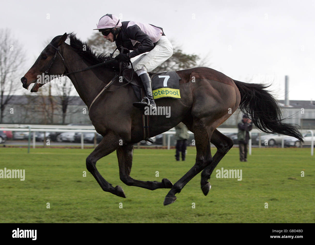 Horse Racing - totesport.com Becher Handicap Chase Day - Aintree Racecourse. Endless Power ridden by James Reveley during The totesuper7 Grand Sefton Handicap Steeple Chase Stock Photo