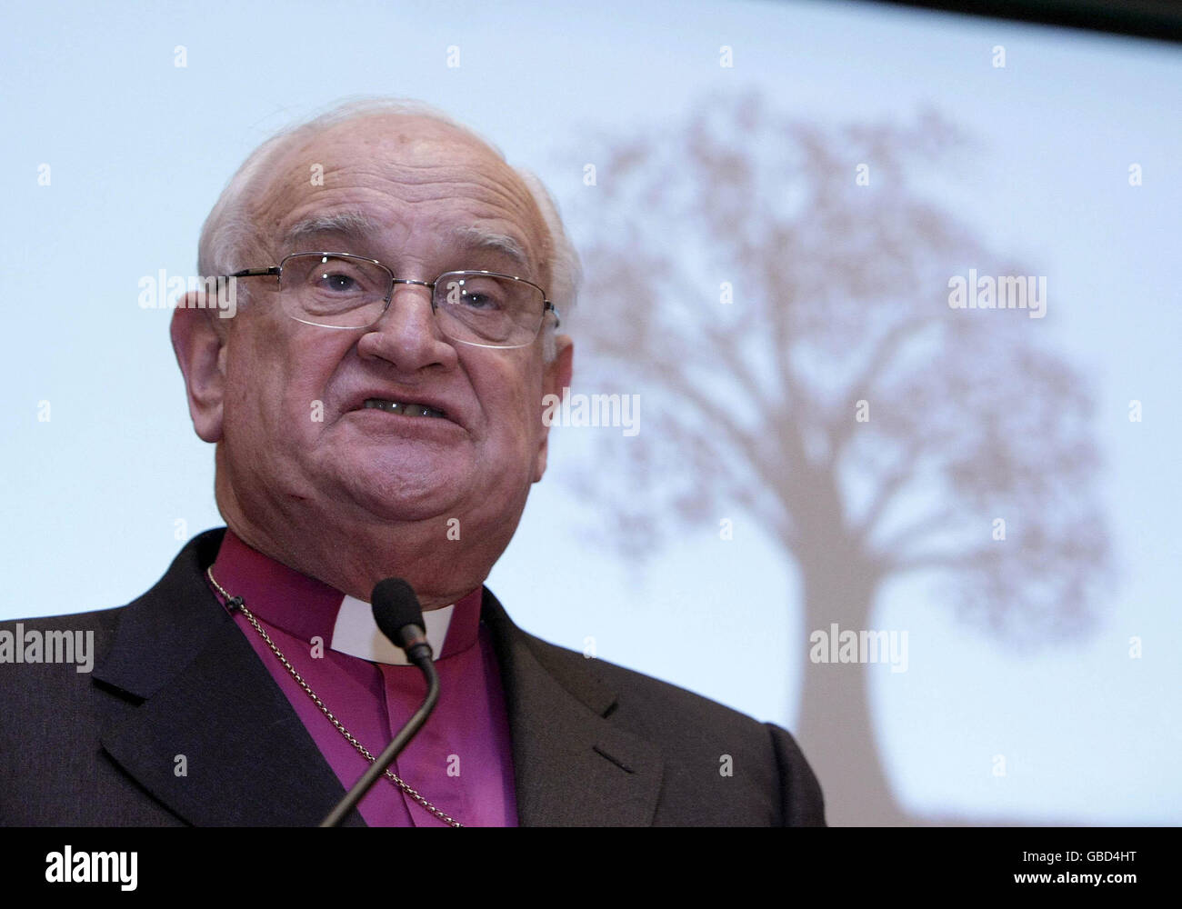 Author Lord Eames speaks at the launch of a report on dealing with three decades of violence. Stock Photo