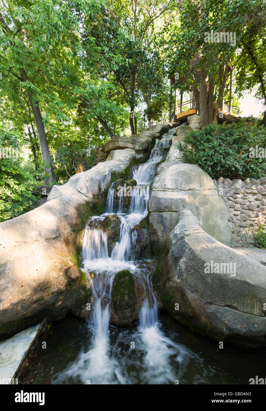 Artificial waterfall at Maria-Luisa-Park, Seville, Spain Stock Photo