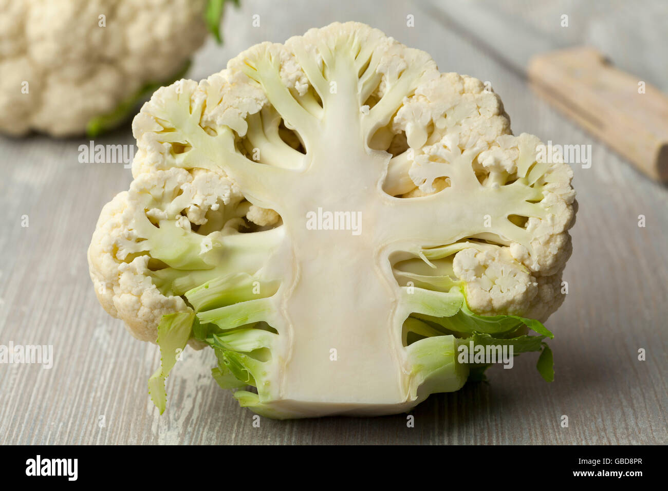 Half fresh white raw cauliflower close up Stock Photo