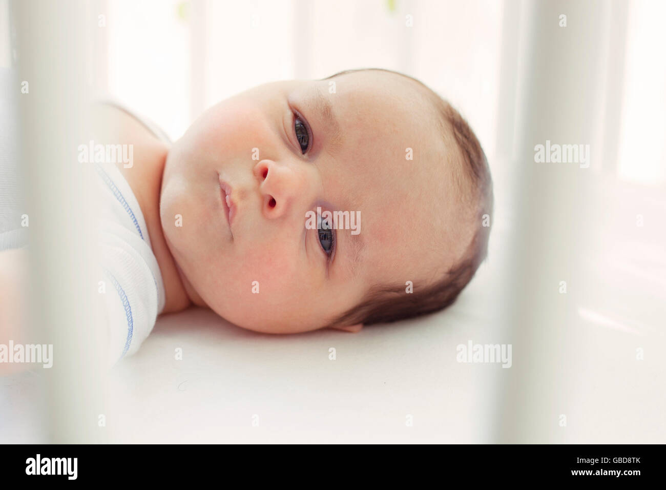 Baby in crib Stock Photo Alamy