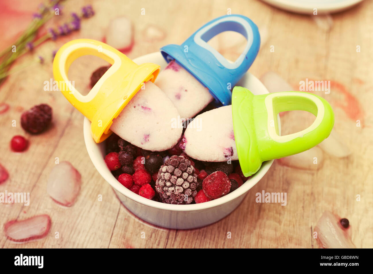 Frozen berry Popsicles for babies Stock Photo Alamy