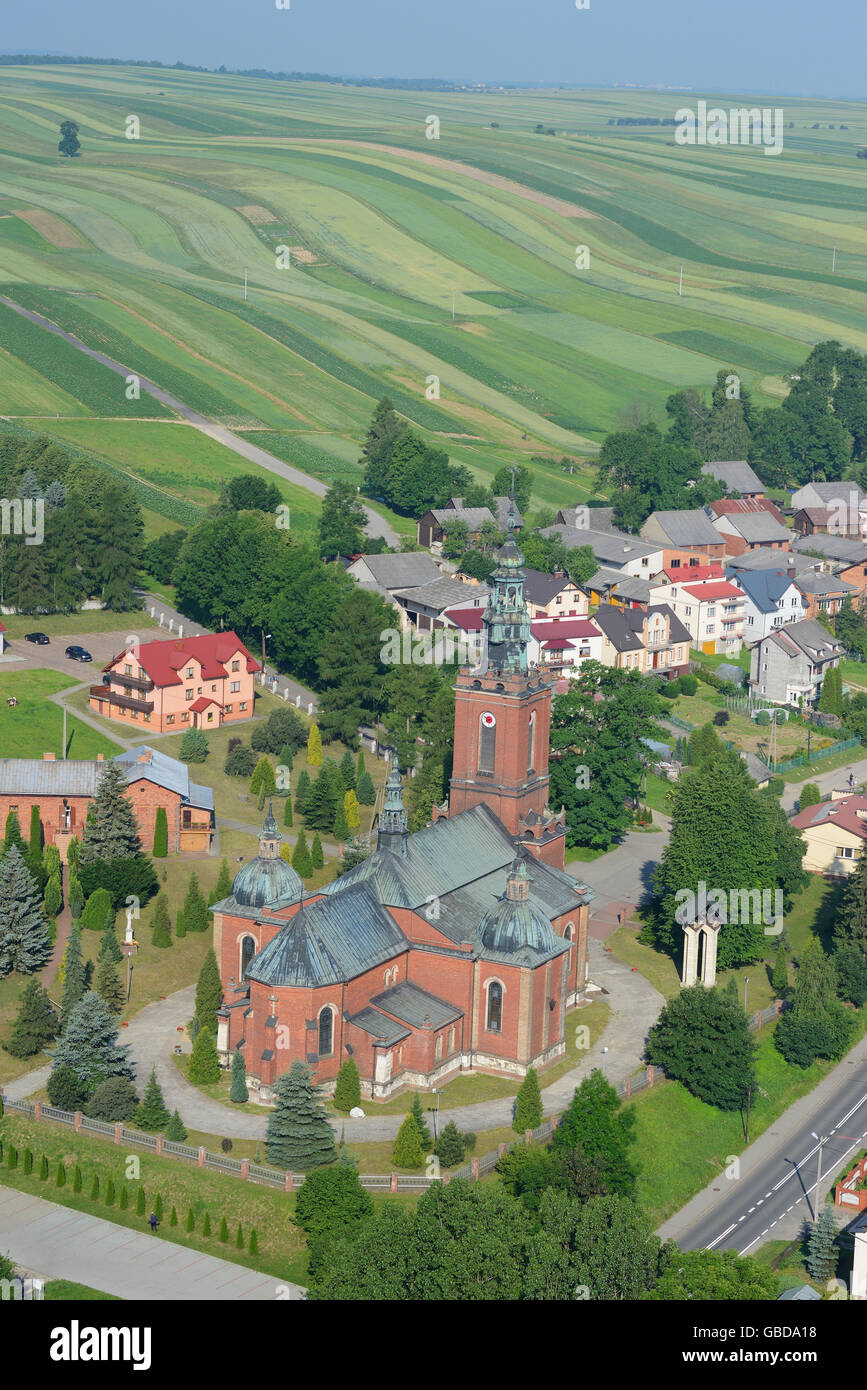 AERIAL VIEW. Church of the Sacred Heart of Jesus. Suloszowa, Lesser Poland Region, Poland. Stock Photo