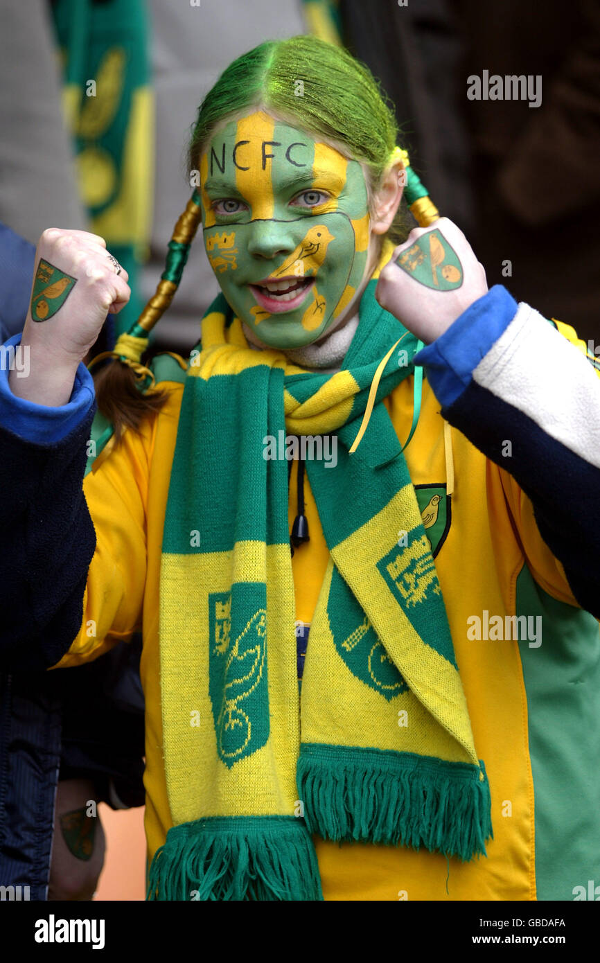 A Norwich City fan soaks up the atmosphere prior to the game with Ipswich  Town Stock Photo - Alamy