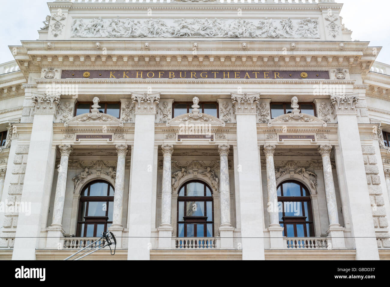 Front facade of Hofburg Burgtheater on Ringstrasse in inner city of Vienna, Austria Stock Photo