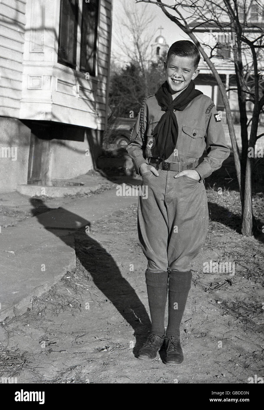 1950s, historical, America, young boy in his Scout uniform, the