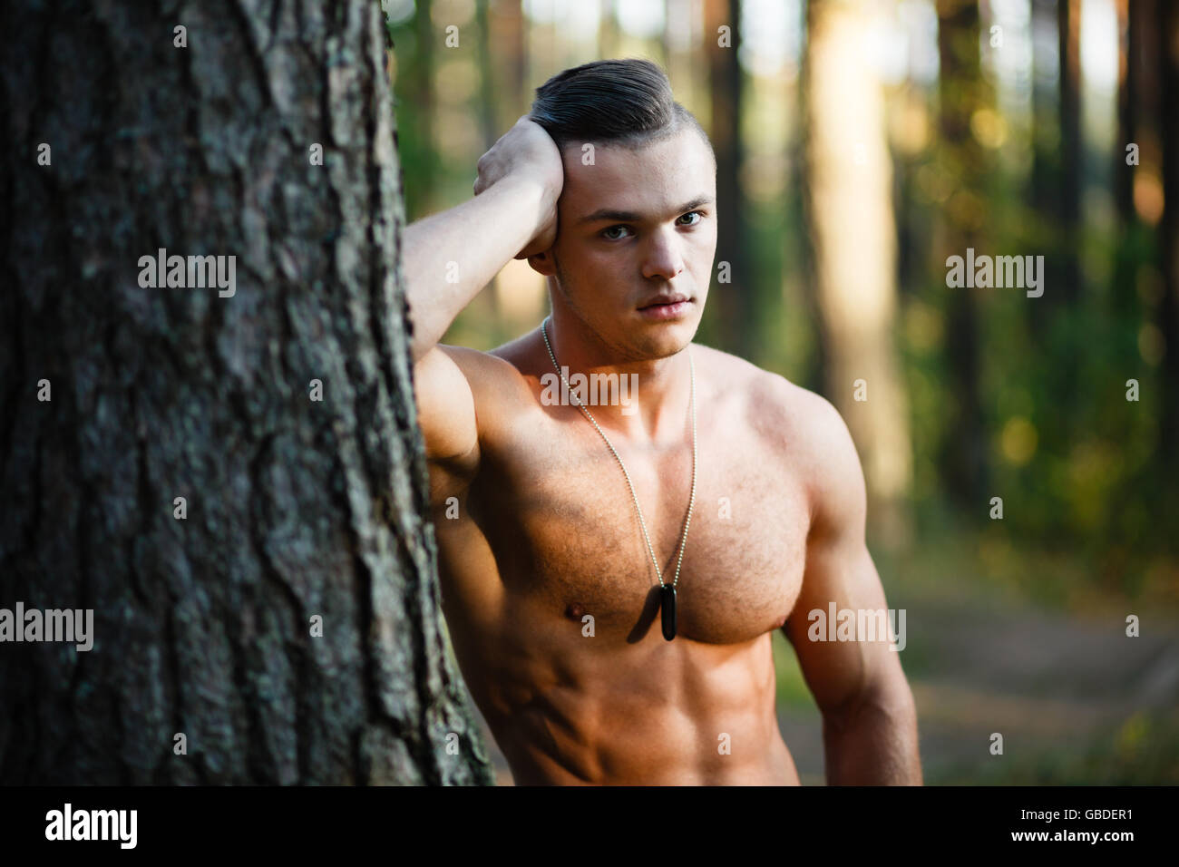 Outdoor portrait of muscular young man Stock Photo