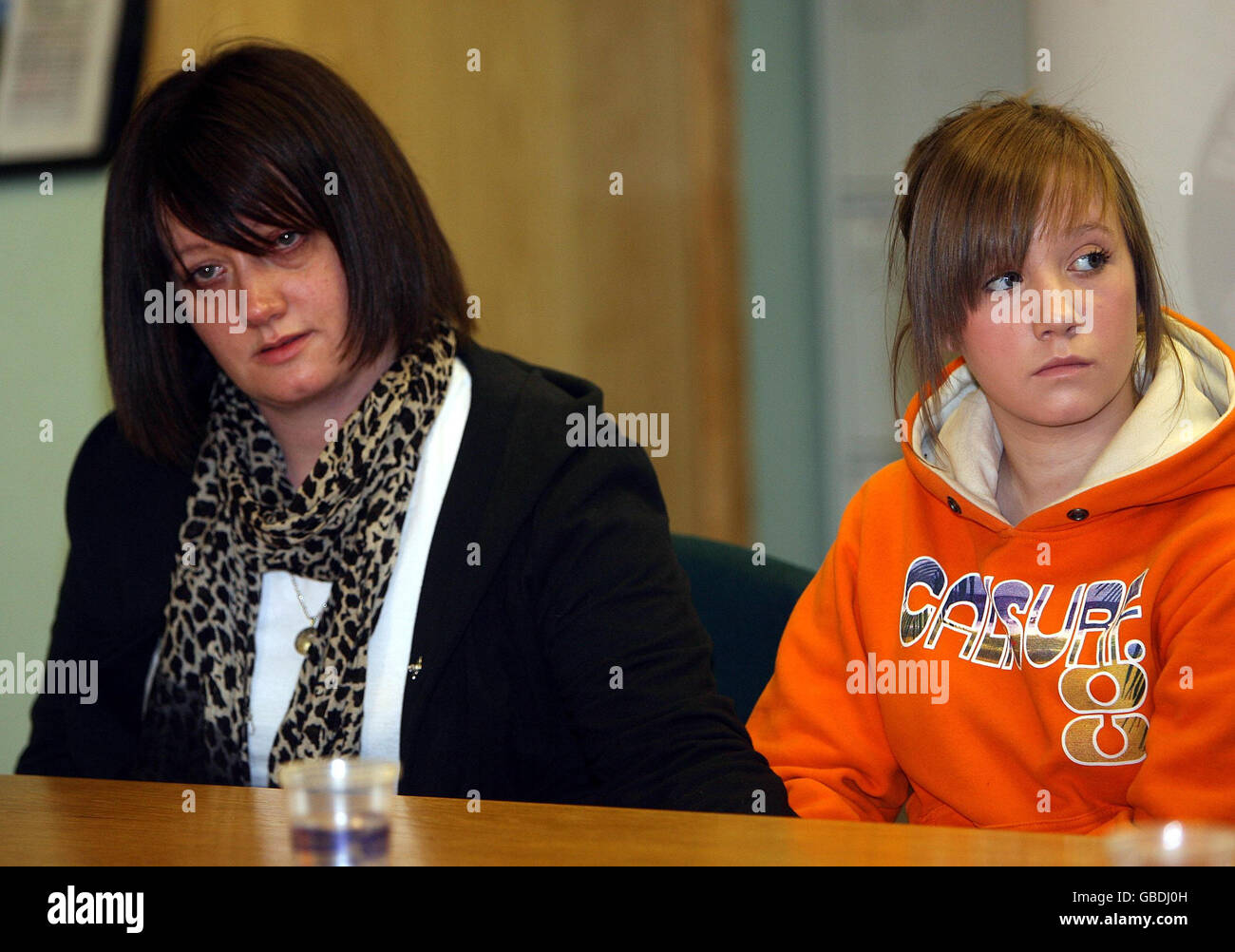 Lisa Kinnaird (left), mother of 14-year-old murder victim Ryan Quinn, with  Ryan's sister, Zara, 13, at a police press conference in Colerain Co  Londonderry Stock Photo - Alamy