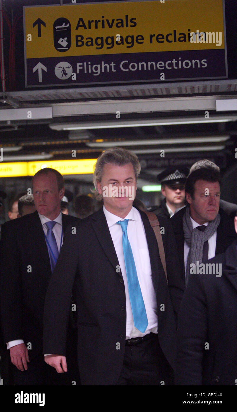 Please note photo shot through glass. Dutch Freedom Party MP Geert Wilders leaves Heathrow Airport on a British Midland plane back to Amsterdam Stock Photo
