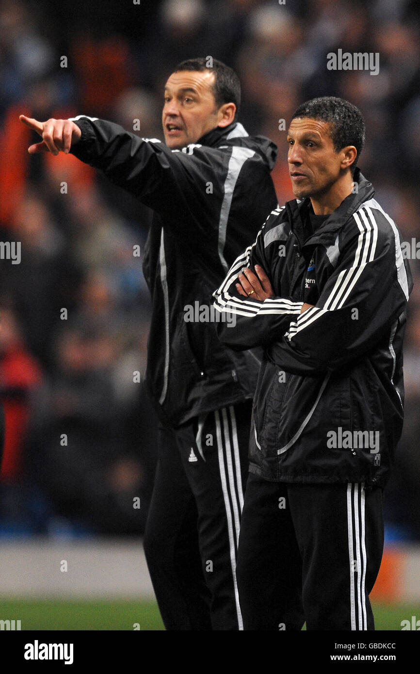 Soccer - Barclays Premier League - Manchester City v Newcastle United - City of Manchester Stadium. Newcastle United's Coach Colin Calderwood (left and assistant Manager Chris Hughton (right) on the touchline Stock Photo