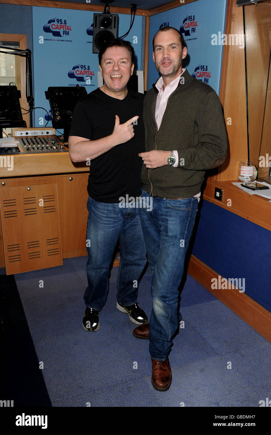 95.8 Capital Radio breakfast show presenter Johnny Vaughan with guest Ricky  Gervais at Capital Radio in Leicester Square, central London Stock Photo -  Alamy
