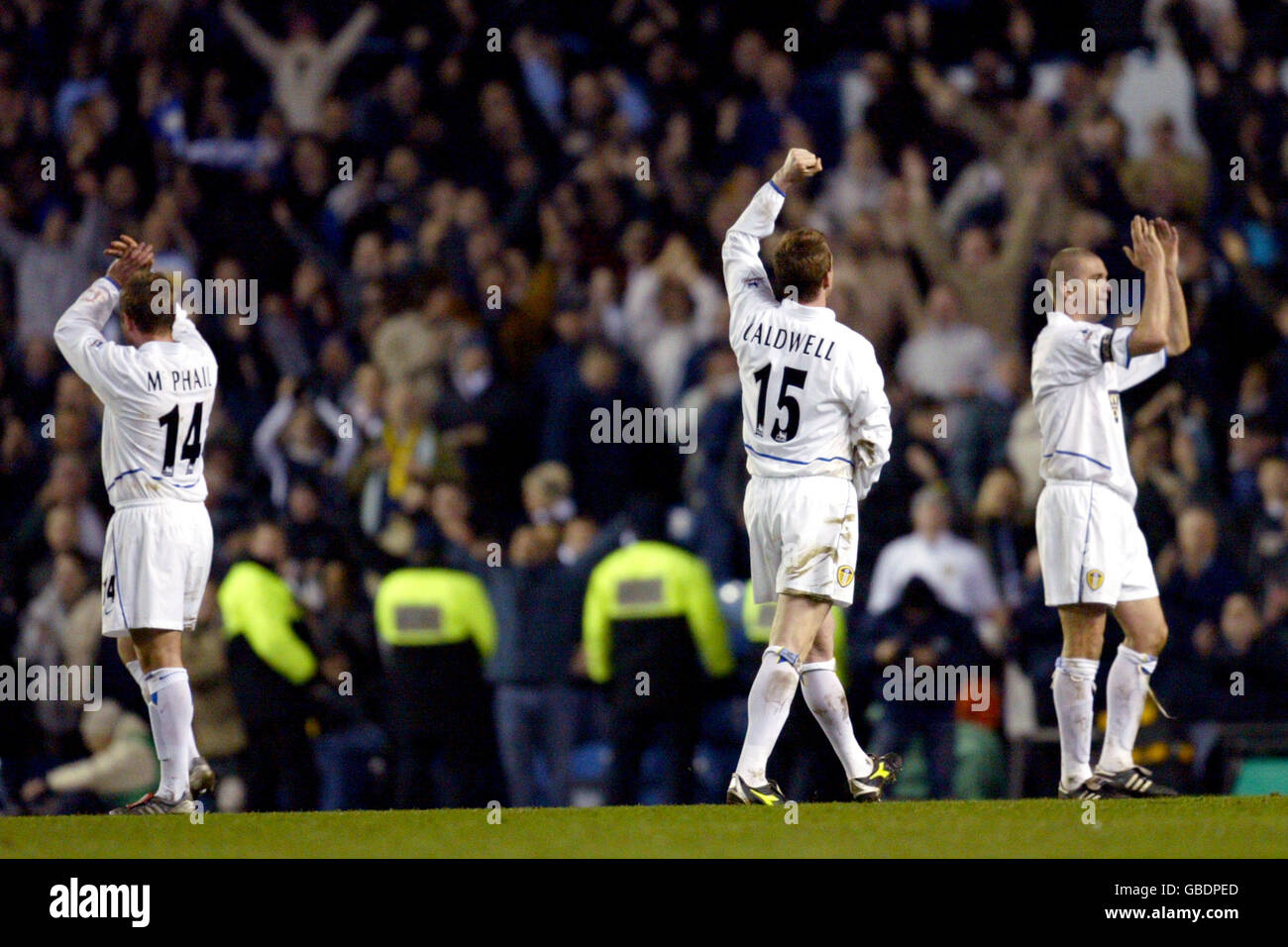Leeds Uniteds Stephen McPhail (l), Stephen Caldwell (c) and Dominic Matteo (r) celebrate victory over Manchester City after the match Stock Photo