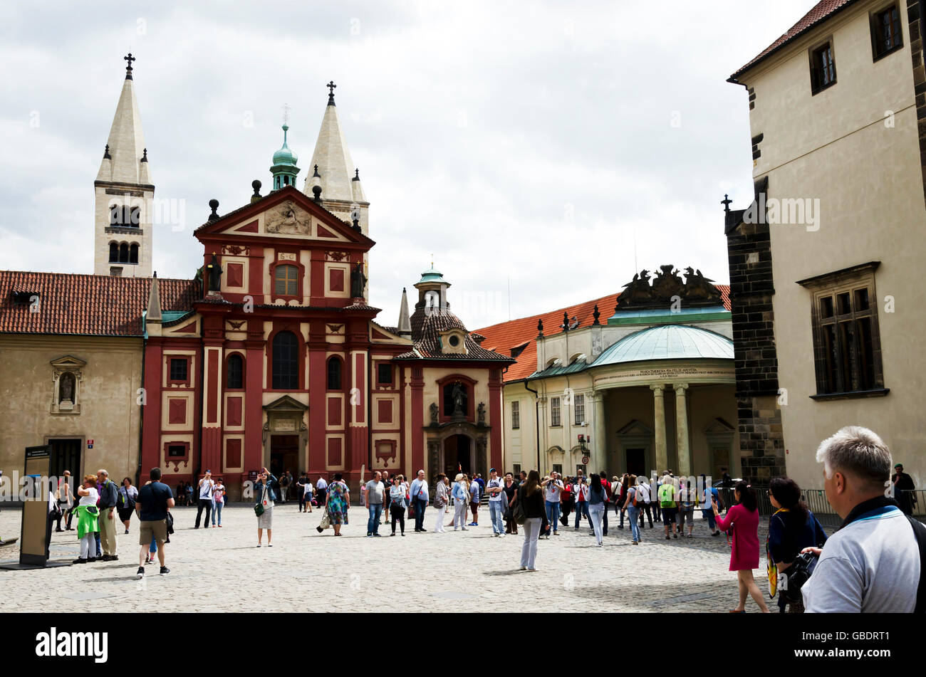The Castle Courtyard and St George's Basilica in the centre of Prague (Praha) in the Czech Republic. Stock Photo