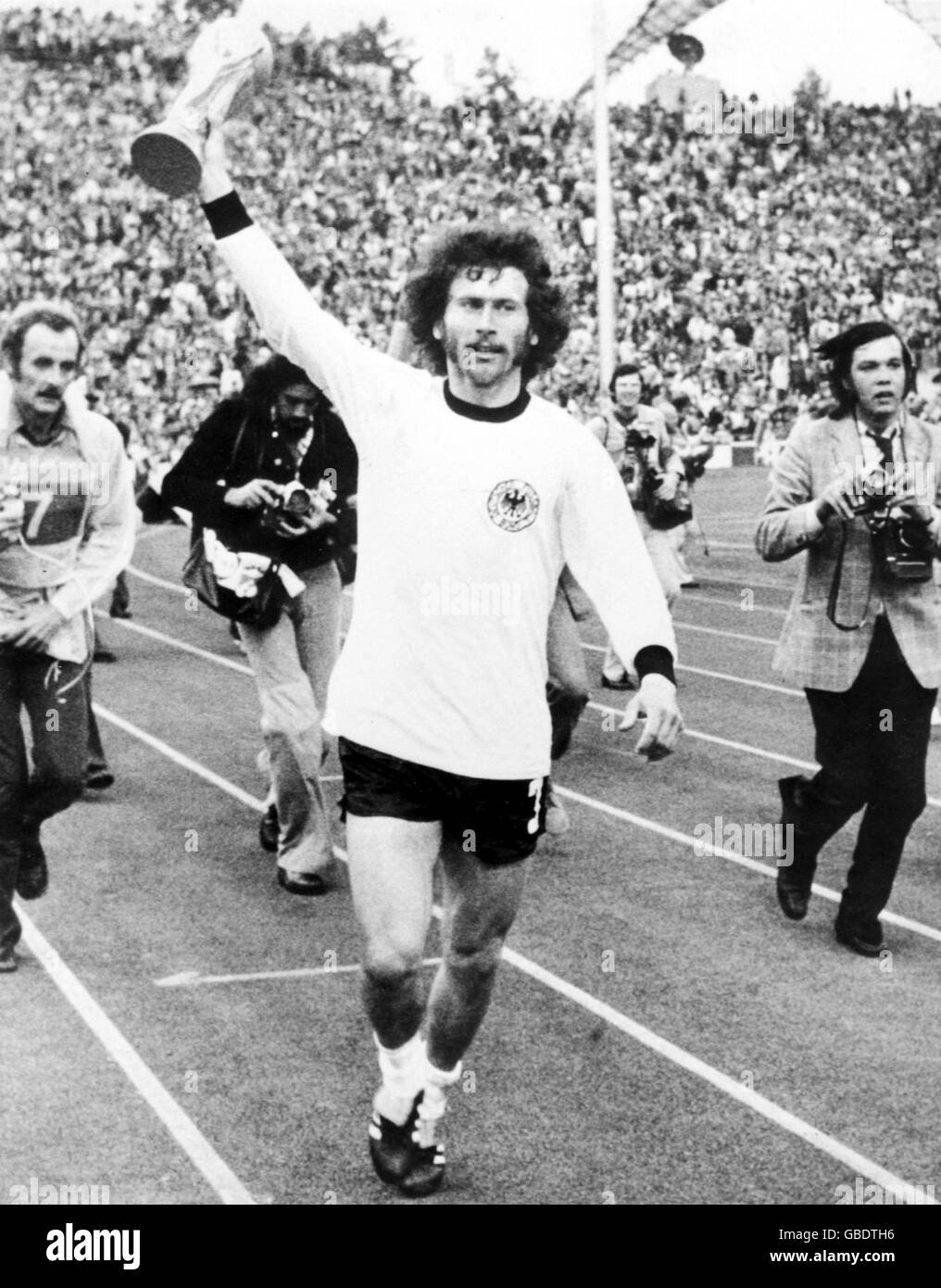 West Germany's Paul Breitner celebrates with the World Cup Stock Photo