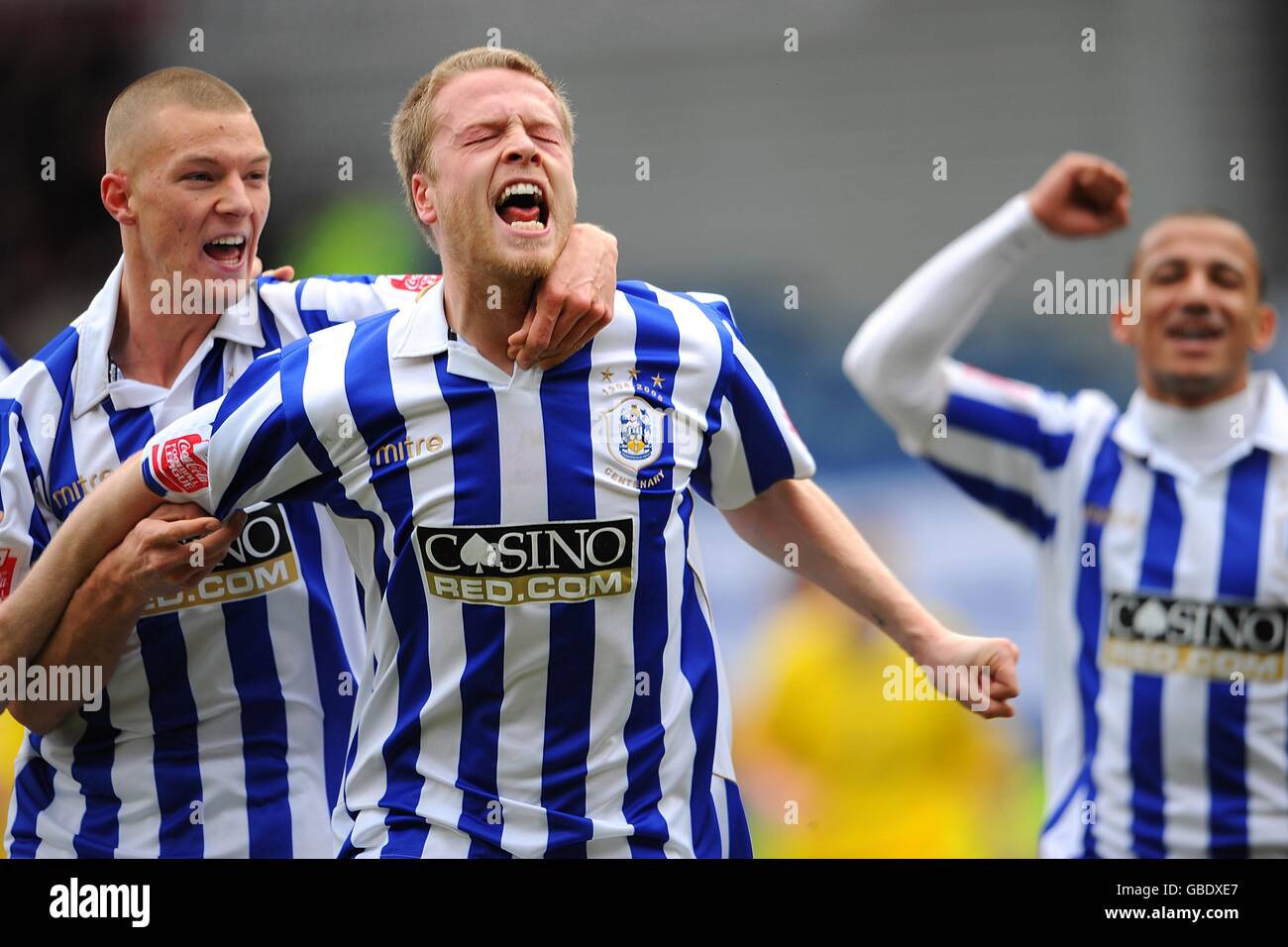 Huddersfield Town's Nathan Clarke (second left) celebrates scoring his sides first goal of the game with his teammates Stock Photo