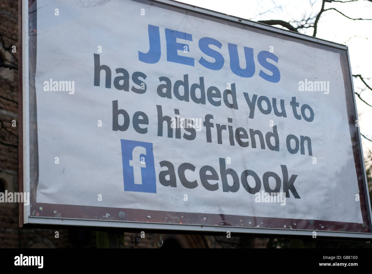 A poster announcing 'Jesus has added you to be his friend on Facebook' outside the St Mary's Parish Church in Radcliffe on Trent, Nottinghamshire. Stock Photo