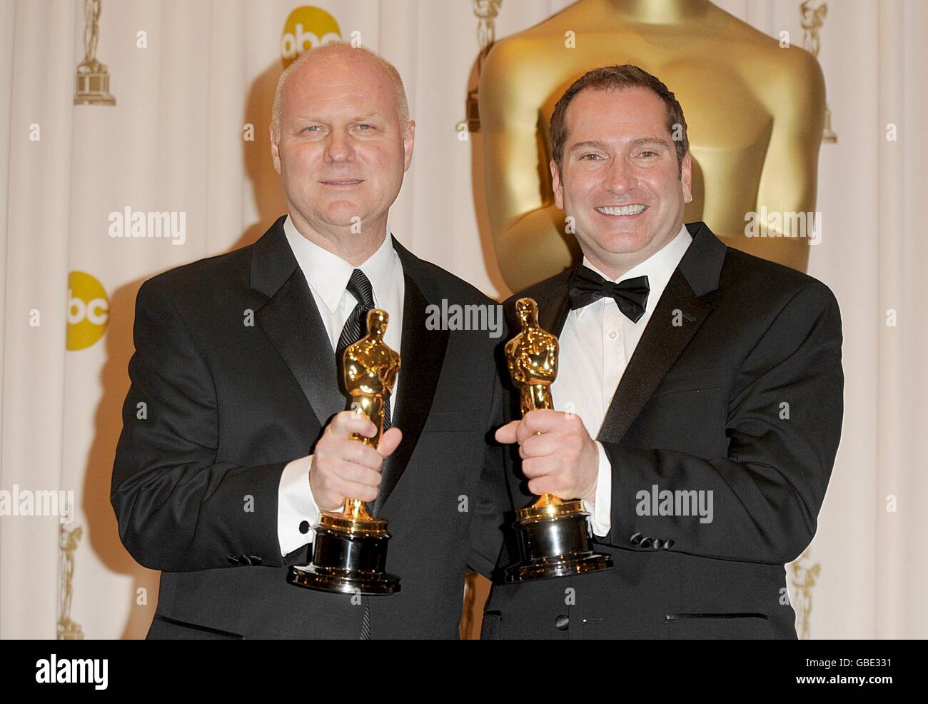 Donald Graham Burt (left) and Victor J. Zolfo with the Achievement in Art Direction award, received for The Curious Case of Benjamin Button, at the 81st Academy Awards at the Kodak Theatre, Los Angeles. Stock Photo