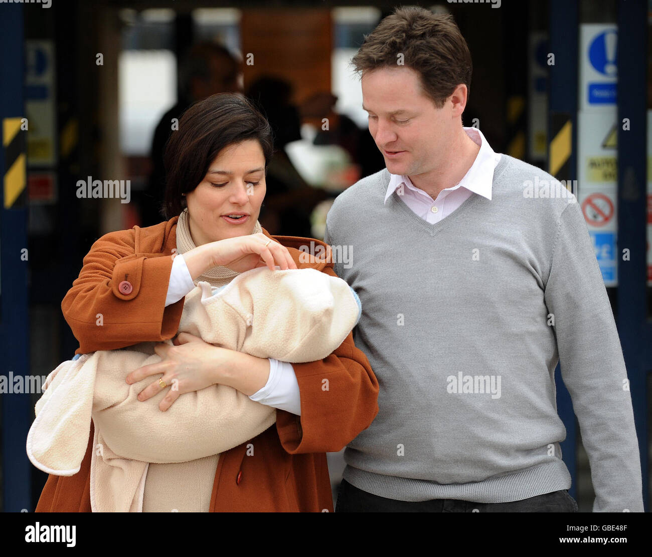 Liberal Democrat Leader Nick Clegg with his wife Miriam Gonzalez Durantez holding their new son, Miguel, who is their third child, leaving Kingston Hospital, in Surrey today. Stock Photo