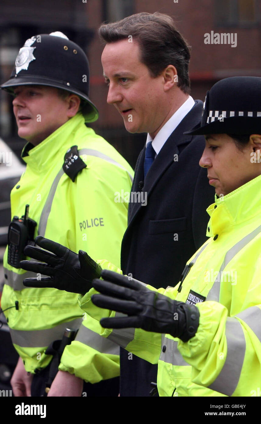 Conservative Party leader David Cameron meets with police officers in Paddington, central London. Stock Photo