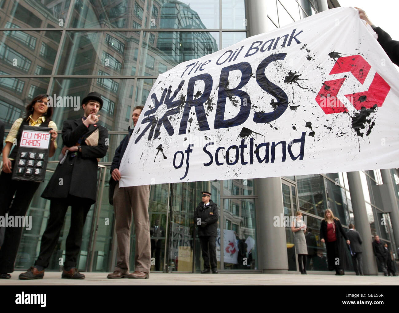 Members of the People and Planet group protest outside the offices of the Royal Bank of Scotland, on Bishopsgate, in the City of London, against investments by RBS in fossil fuel projects. Stock Photo