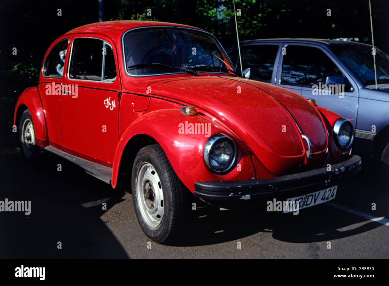 transport / transportation, car, vehicle variants, Volkswagen, red VW Beetle 1300, side view from ahead, Germany, circa 1990, motor car, auto, automobile, passenger car, motorcar, motorcars, autos, automobiles, passenger cars, parking, antenna, antennae, antennas, bumper, bumper bar, bumpers, bumper bars, bow, bows, front, fronts, headlight, 1990s, 90s, 1980s, 80s, 20th century, transport, transportation, car, cars, beetle, bug, beetles, bugs, historic, historical, Additional-Rights-Clearences-Not Available Stock Photo