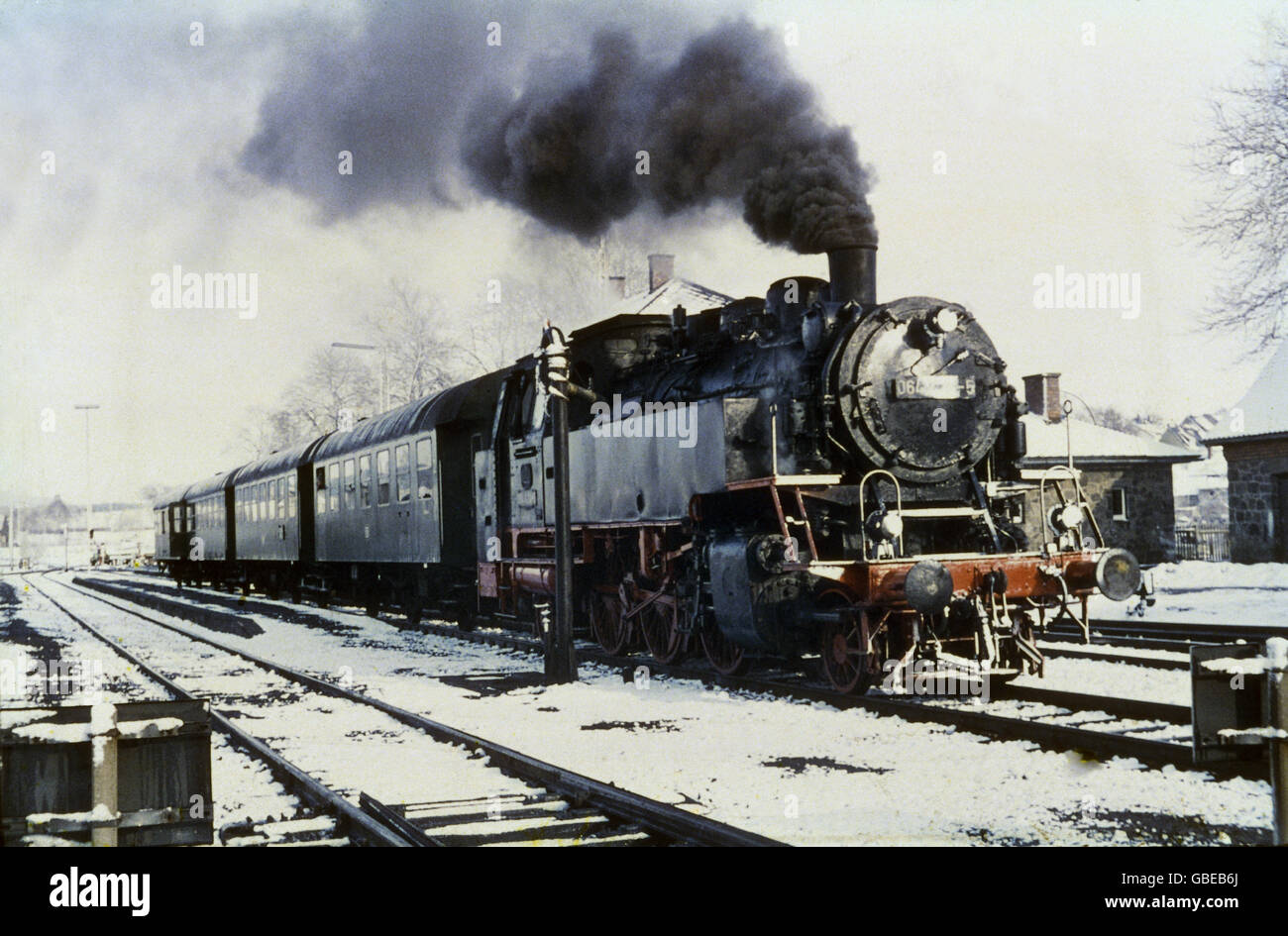 transport / transportation, railway, locomotives, Lok 064424, Bw Weiden, P 3824, filling up water at Vohenstrauss, 3.4.1970, 1970s, 70s, 20th century, historic, historical, Bavaria, Upper Palatinate, steam railway, steam locomotive, steam locomotives, railway, railroad, railways, railroads, passenger train, attention, maintenance, service, maintenances, fume, dense smoke, winter, train, trains, Additional-Rights-Clearences-Not Available Stock Photo