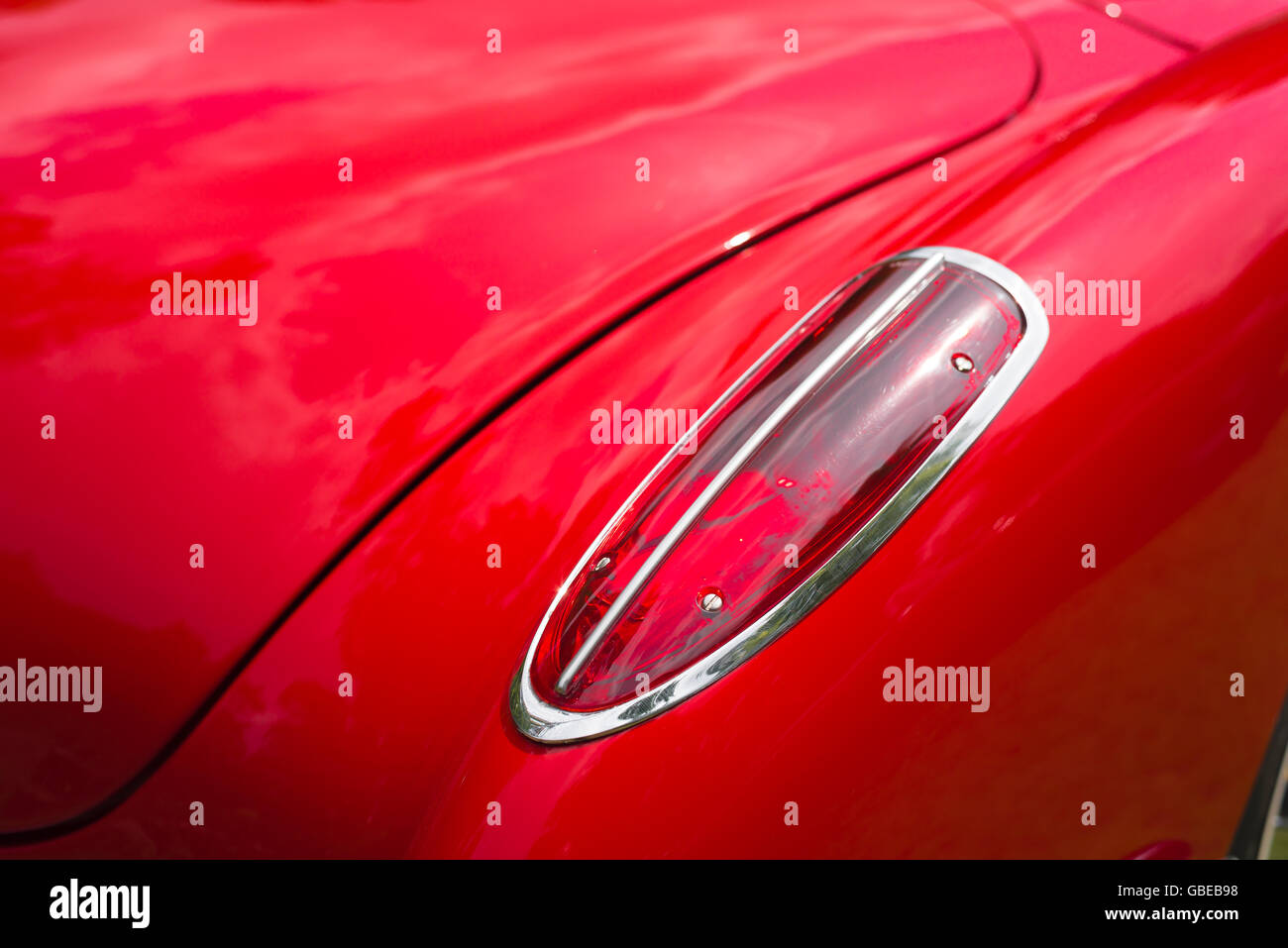 Detail of the rear wing and tail light of a 1958 Corvette Stingray Convertible car. Stock Photo