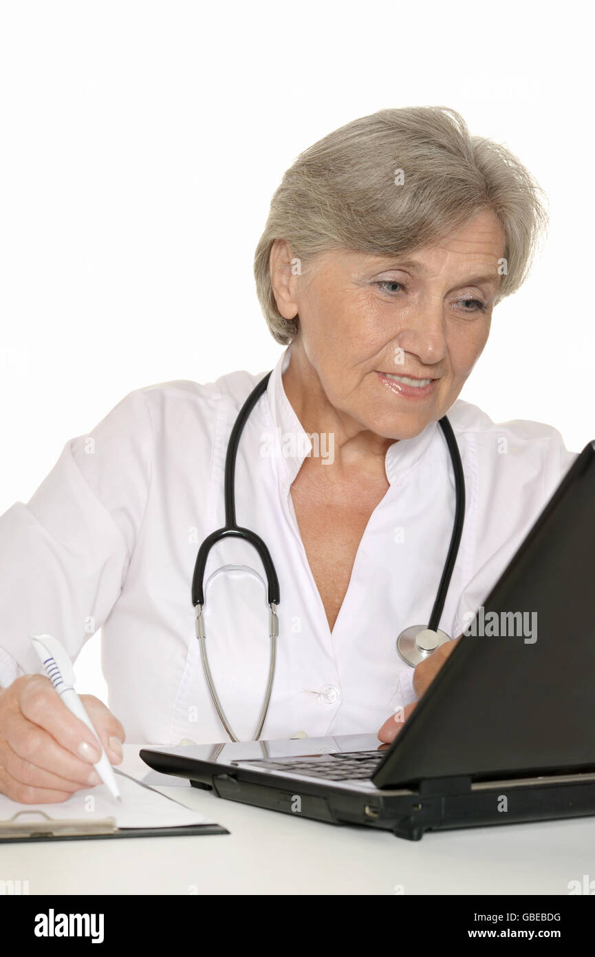 Thoughtful senior doctor Stock Photo - Alamy