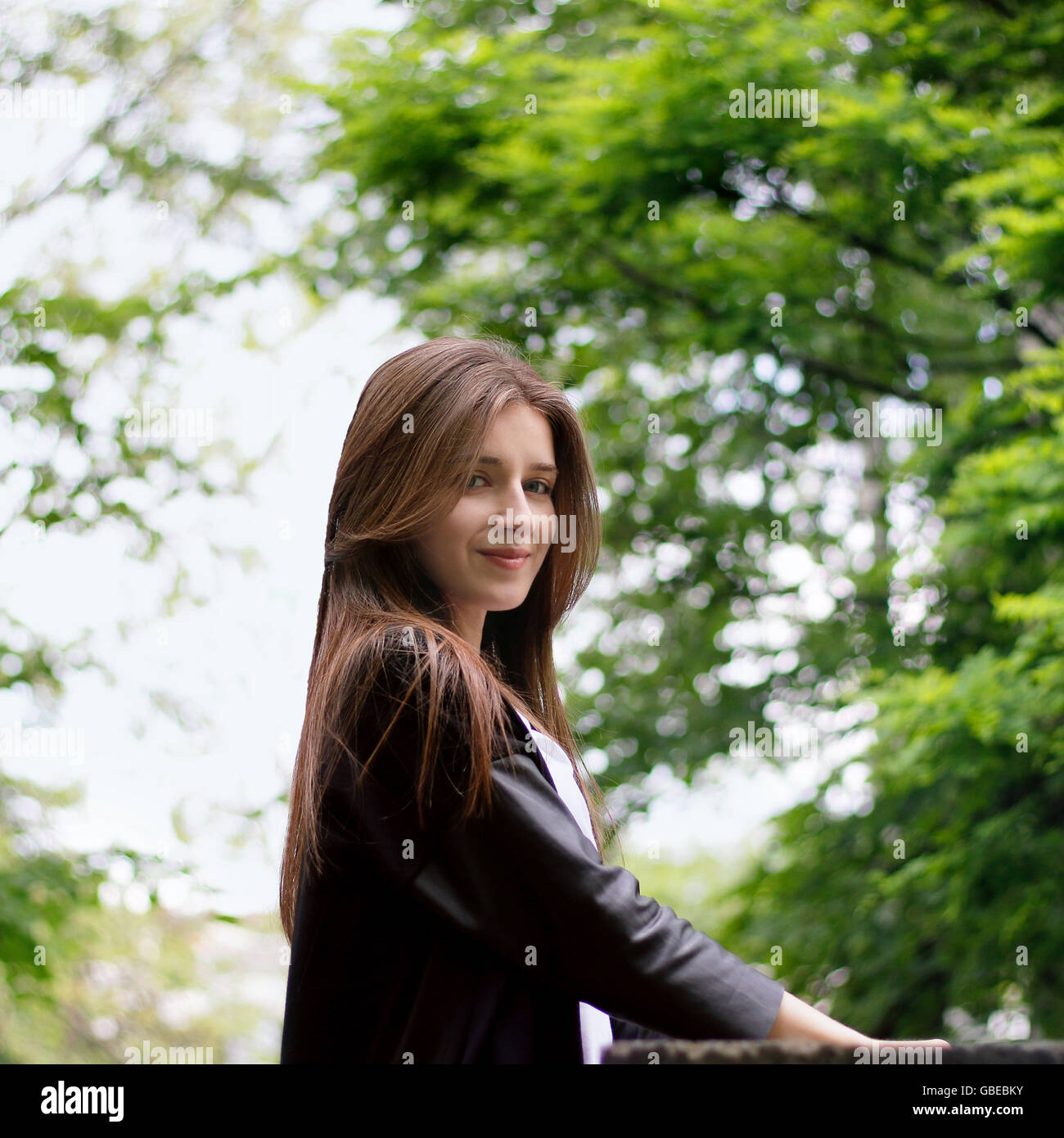 pretty young girl walking in the park Stock Photo - Alamy