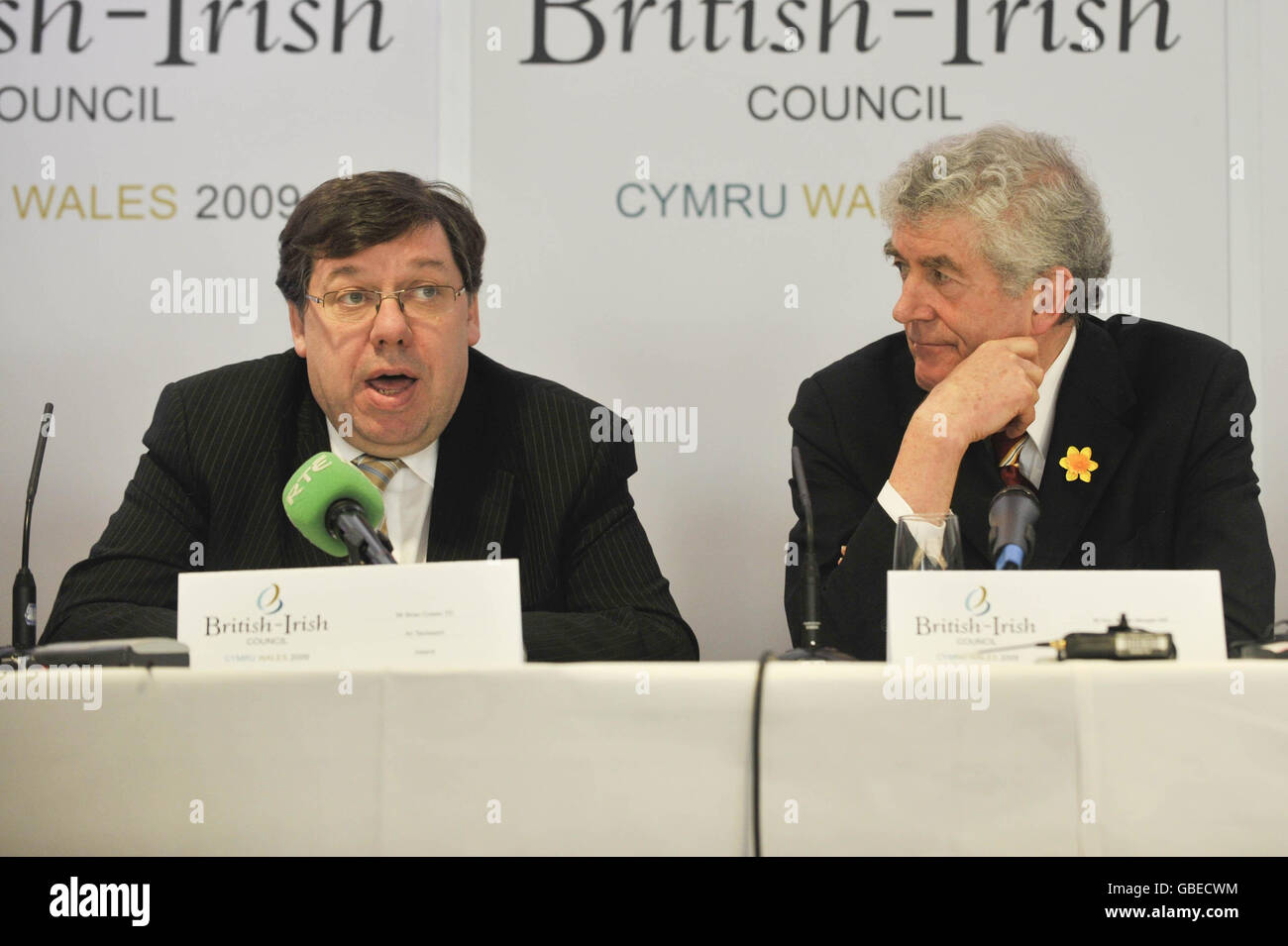 Taoiseach of Ireland Brian Cowen (left) and Welsh First Minister Rhodri Morgan listen to questions during a press conference at the British-Irish council meeting in the Swalec Stadium, Cardiff, Wales. Stock Photo