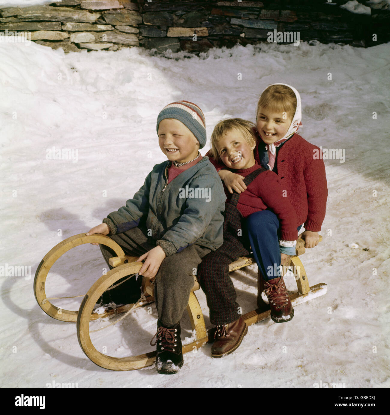 people, child, 1950s, three children on a sledge, mountain farmer, Additional-Rights-Clearences-Not Available Stock Photo