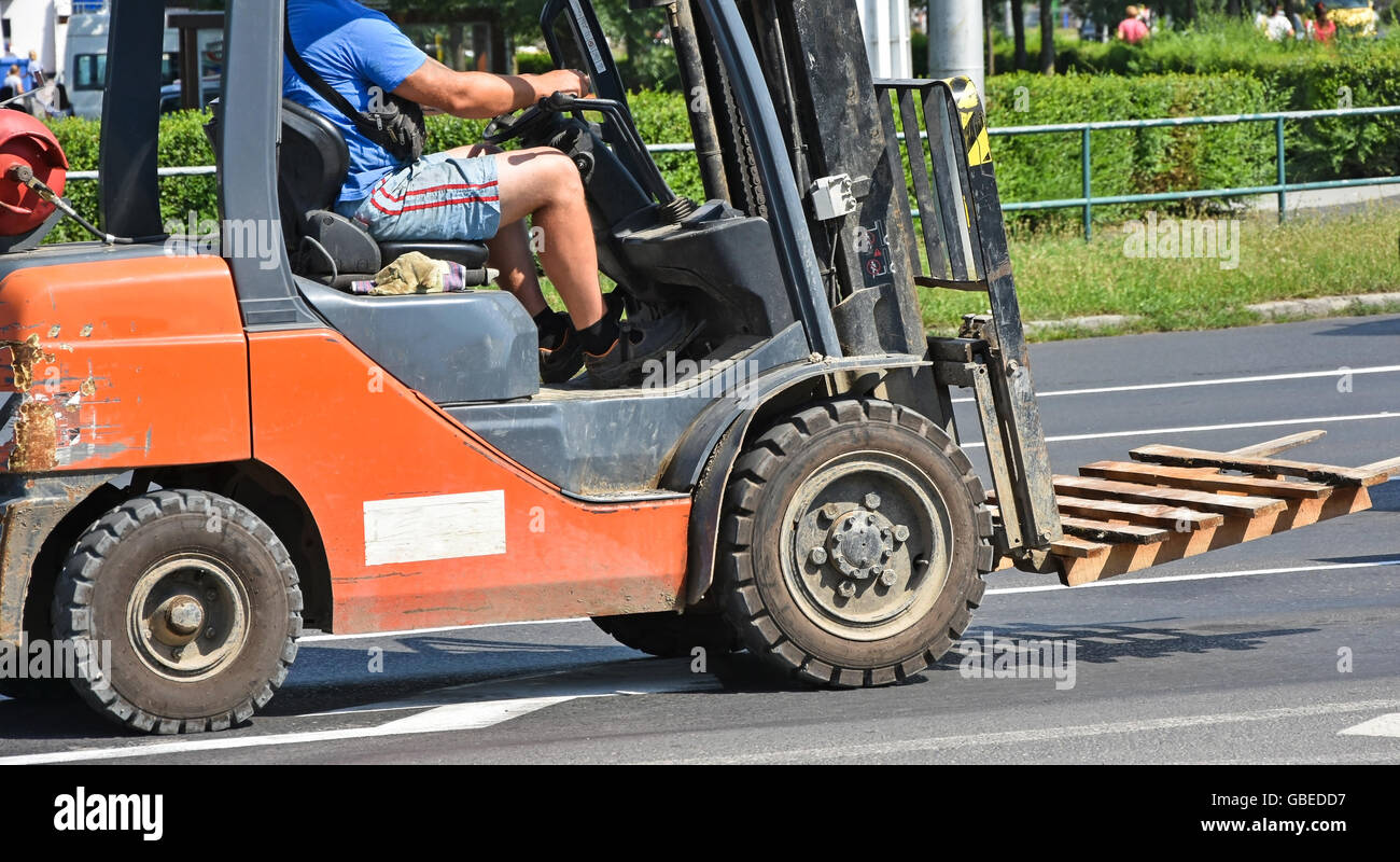 Forklift on the street in the city Stock Photo Alamy