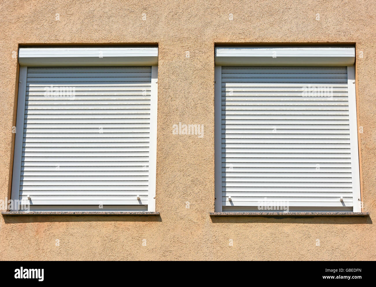 Yellow wall two windows hi-res stock photography and images - Alamy