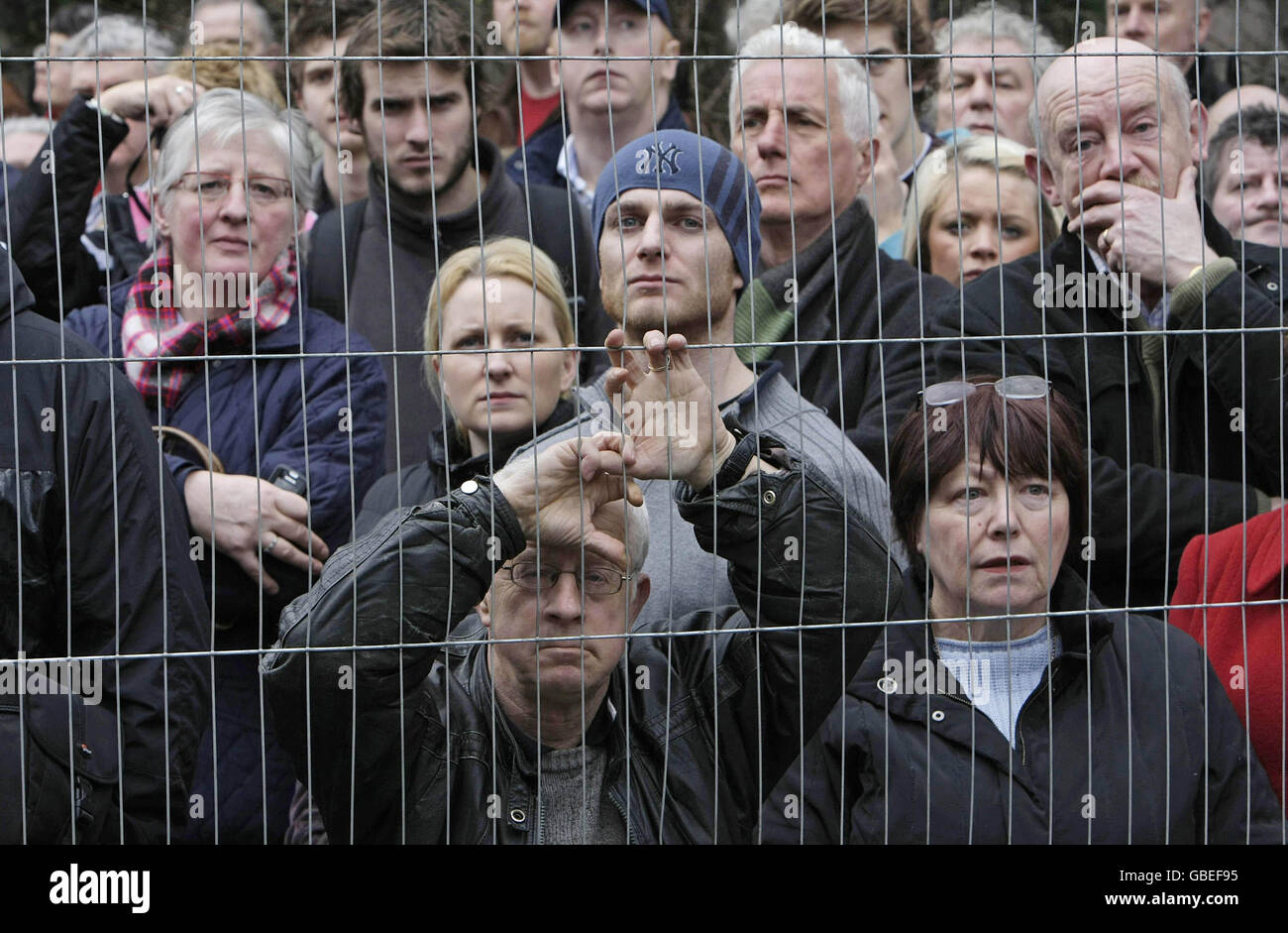 Public sector workers listen to union leaders speaking at a massive protest on the streets of Dublin today to demonstrate over the Government's handling of the recession. Stock Photo