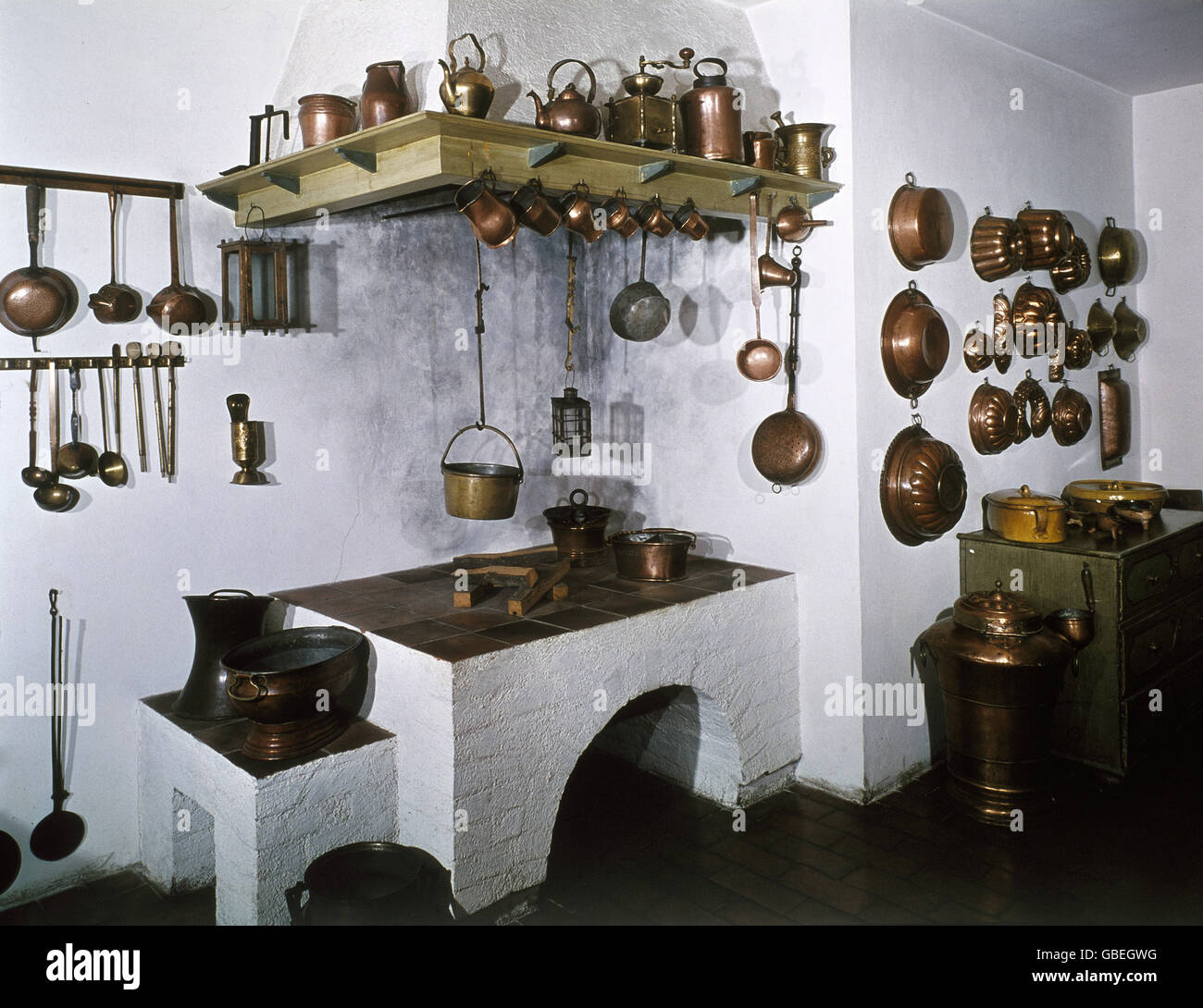 furnishing, kitchen, reconstruction of a kitchen fron the 19th century, municipal museum, Munich, 19th century, historic, historical, accommodation, living, kitchen, cooking, baking, stove, pot, pots, cooking pot, cooking pots, baking dish, baking pan, baking dishes, baking pans, vessel, vessels, kitchen equipment, copper, furnishings, interior furnishings, Additional-Rights-Clearences-Not Available Stock Photo