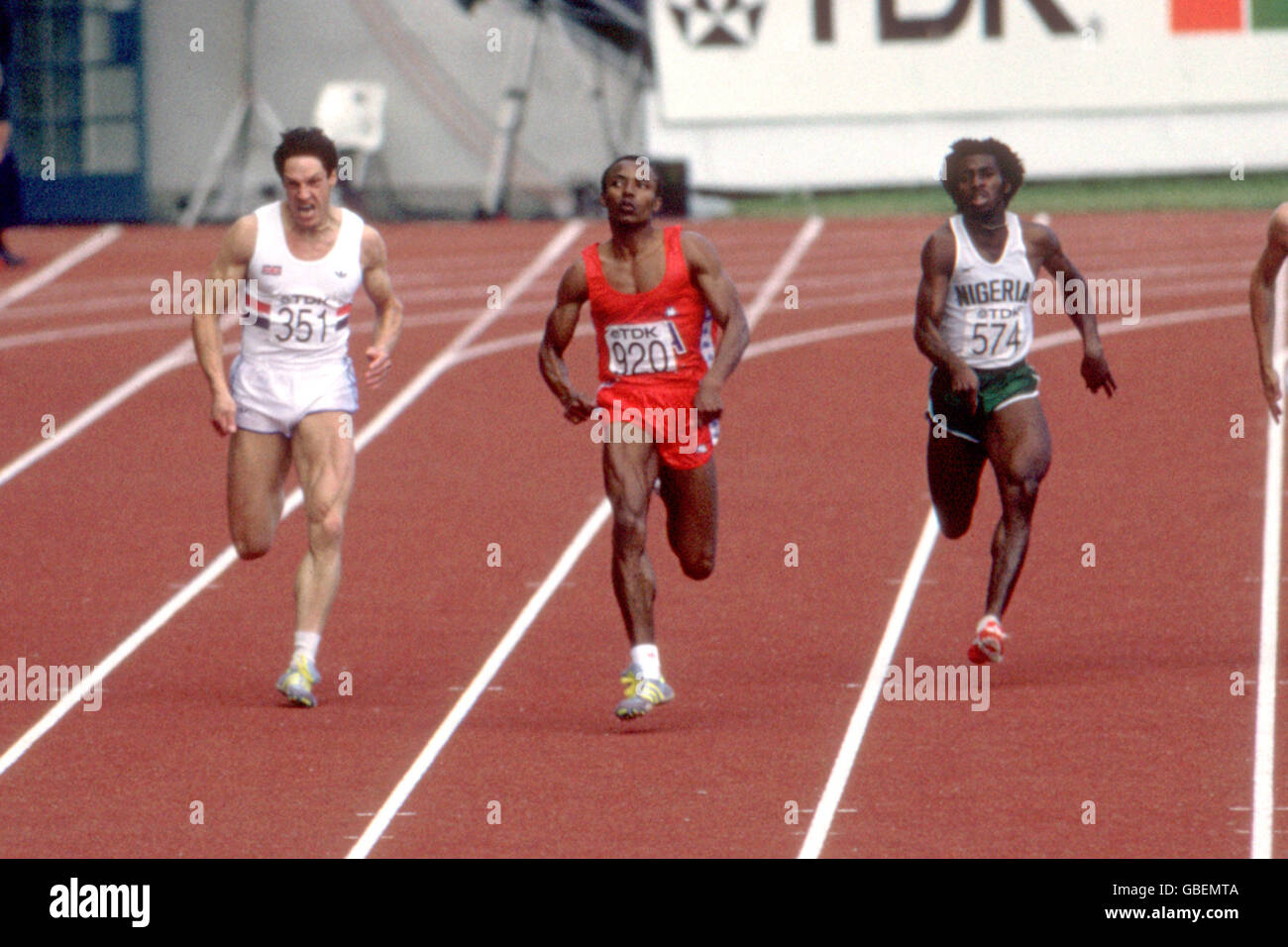 USA's Calvin Smith (c) leads from Great Britain's Alan Wells (l) and Nigeria's Innocent Egbunike (r) Stock Photo