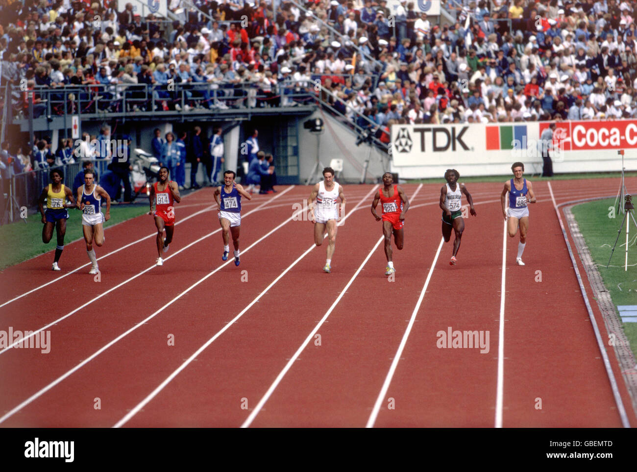 USA's Calvin Smith (third r) leads from teammate Elliott Quow (third l), Italy's Pietro Mennea (fourth l), Great Britain's Alan Wells (fourth r), East Germany's Frank Emmelmann (second l), Nigeria's Innocent Egbunike (second r), Italy's Carlo Simionato (r) and Brazil's Joao Batista Da Silva (l) Stock Photo