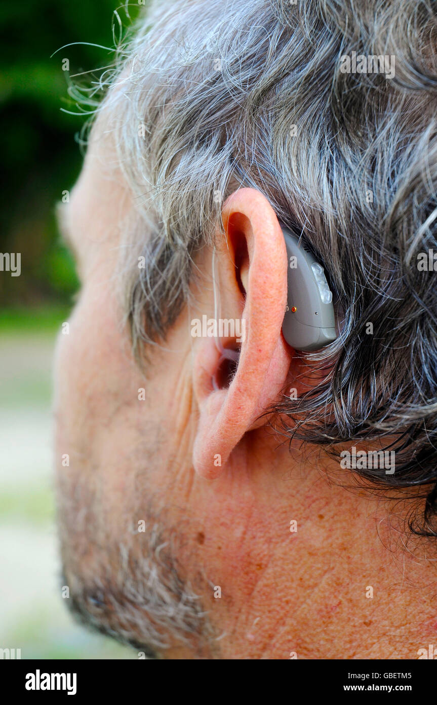 Hearing aid, man, 65 70 years, hardness of hearing, Germany / deaf