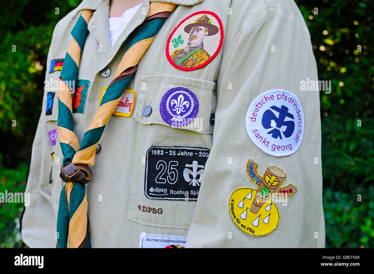 Boy, 13 years, shirt, scarf, gear, badges, Boy Scout, Germany Stock Photo